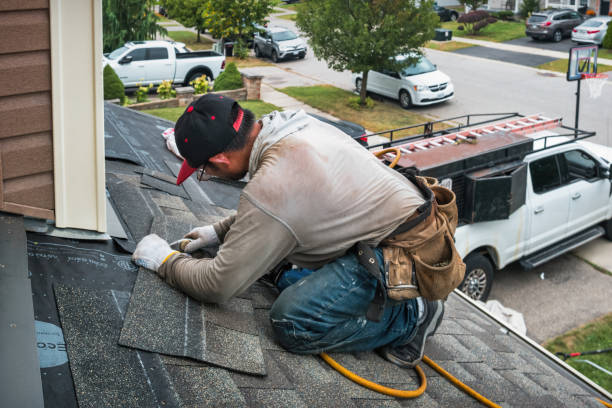 Professional Roofing technician working in Lamont, CA